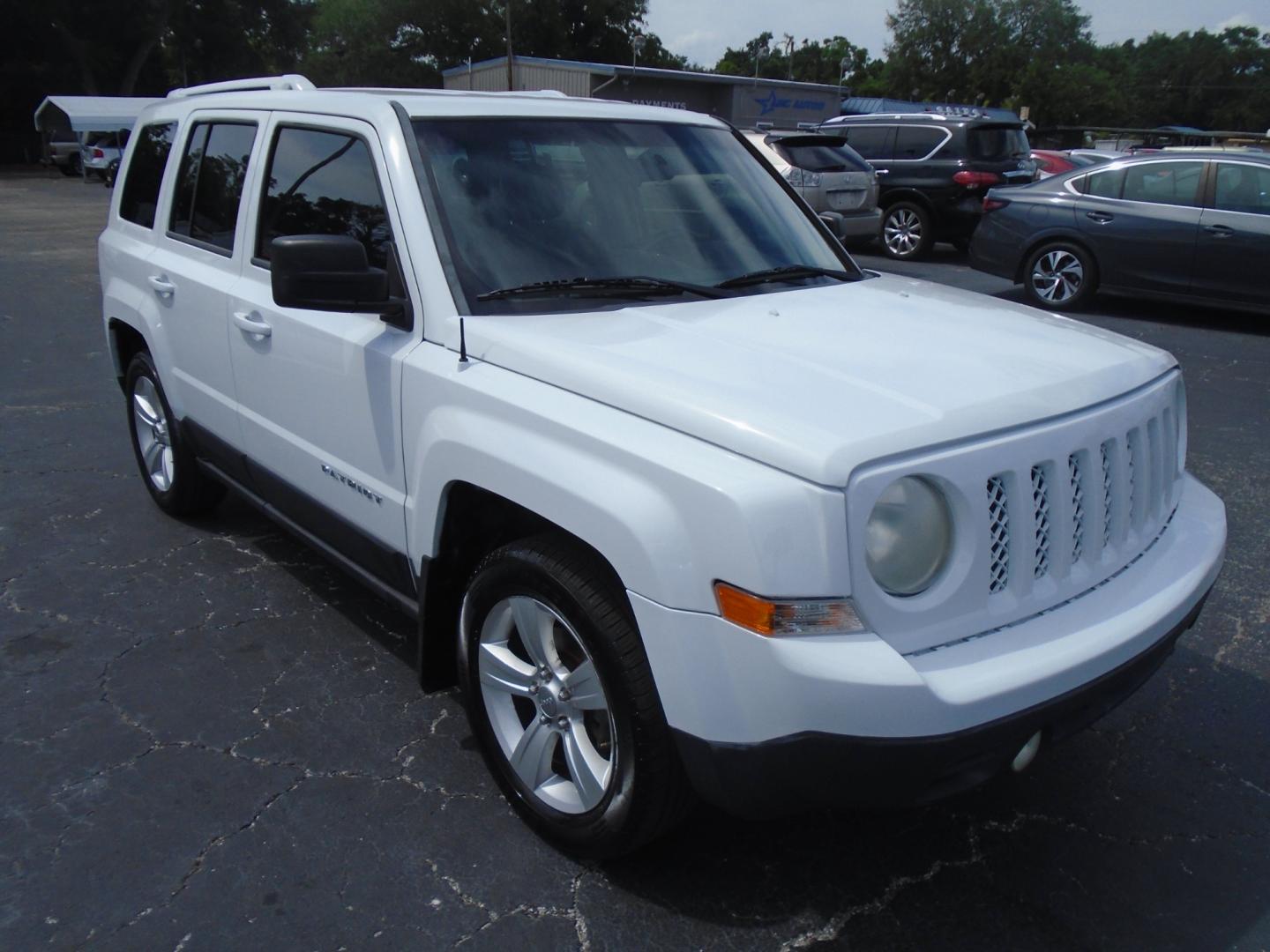 2014 Jeep Patriot Latitude 2WD (1C4NJPFA5ED) with an 2.0L L4 DOHC 16V engine, located at 6112 N Florida Avenue, Tampa, FL, 33604, (888) 521-5131, 27.954929, -82.459534 - Photo#2